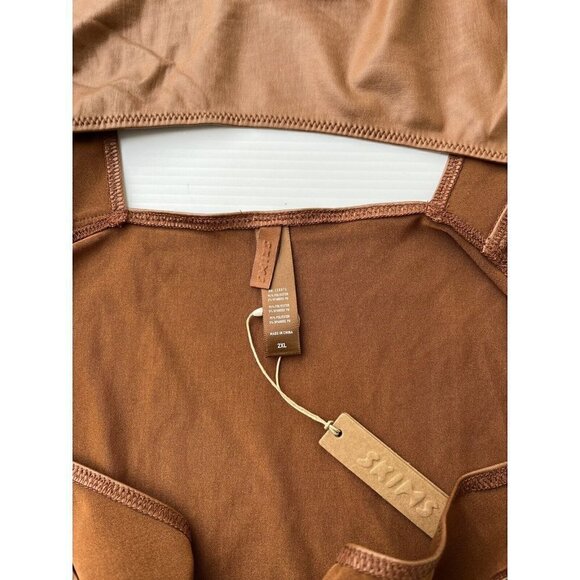 SKIMS Kim Kardashian Wet Jersey Cutout Swimsuit in Copper - Picture 4 of 6